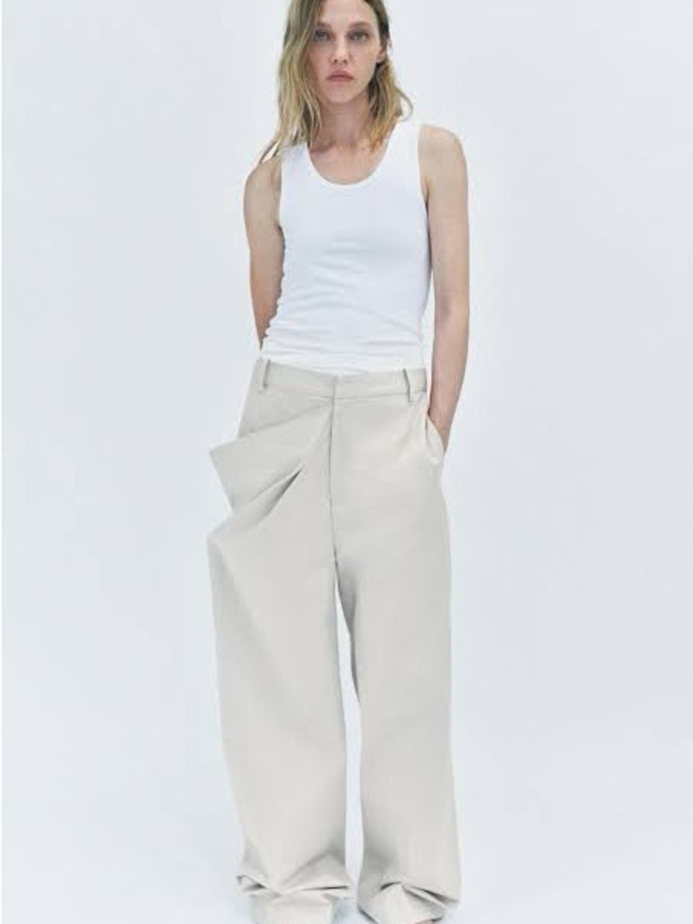 Zara’s Ruched Wide-Leg Pleated Trousers in Light Beige